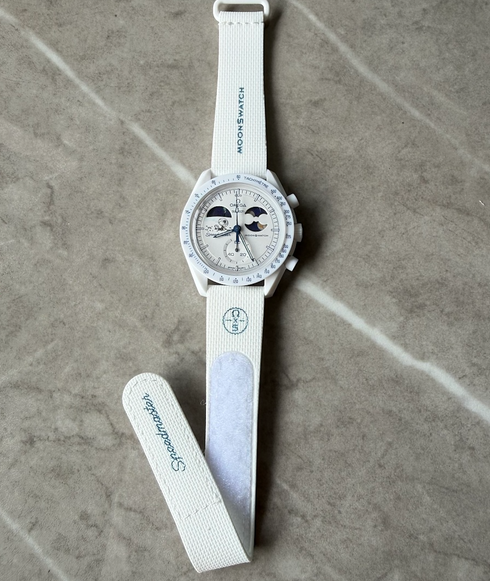 Swatch x Ome. Moonphase Gold Premium Edition