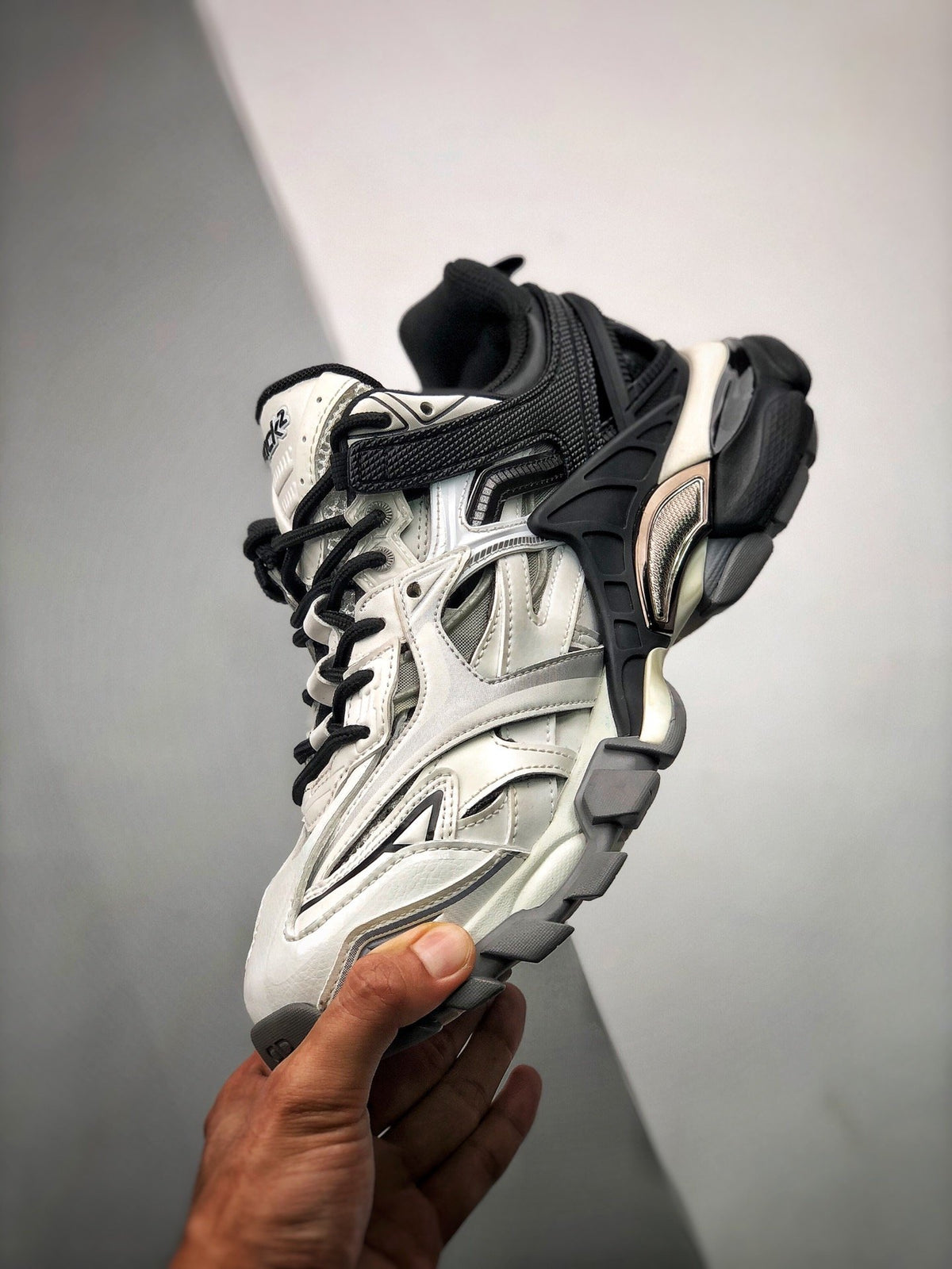 Sneakers Track 2.0 'Blanc Noir'