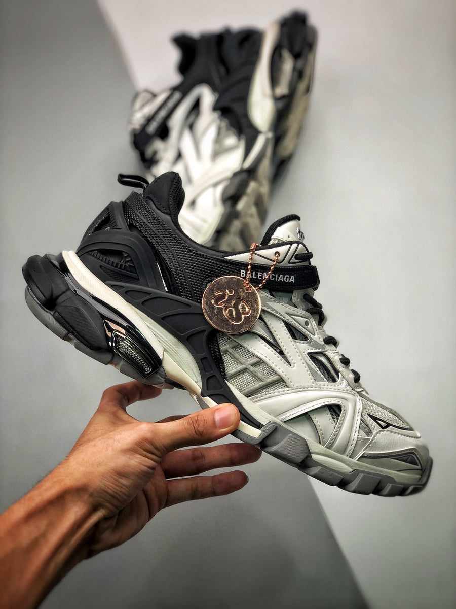 Sneakers Track 2.0 'Blanc Noir'