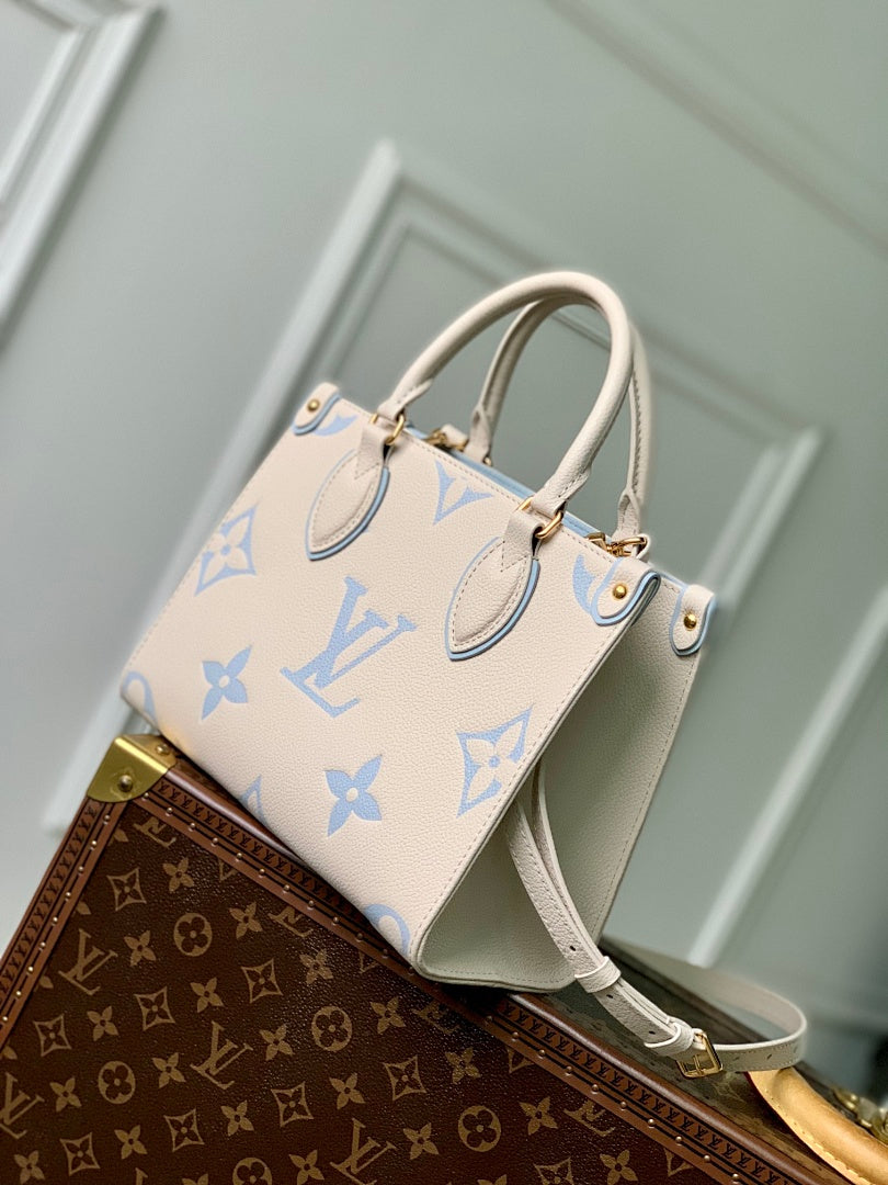 Sac à main OnTheGo – Réf. M45659 · Sérigraphie Bleu