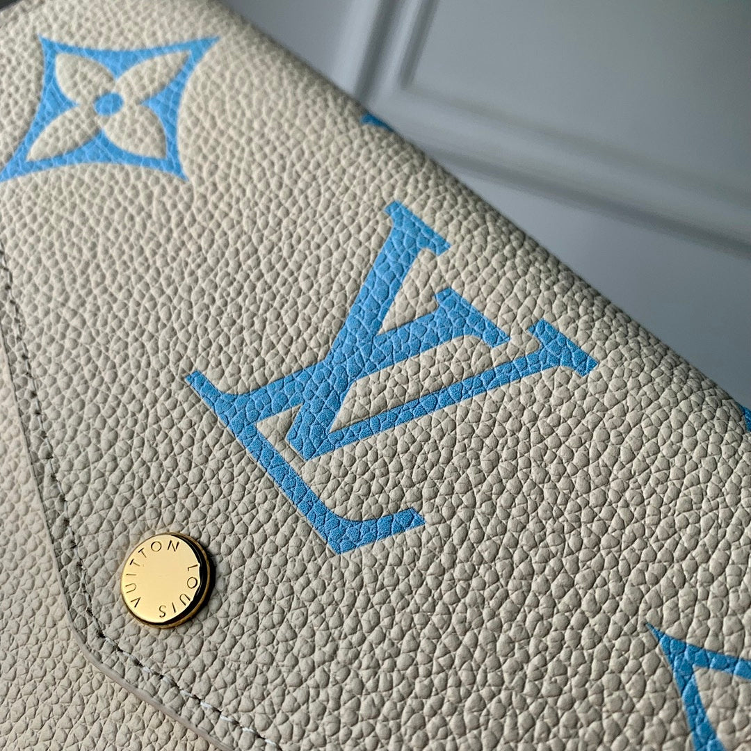 Portefeuille – Réf. M81049 · Bleu Brume