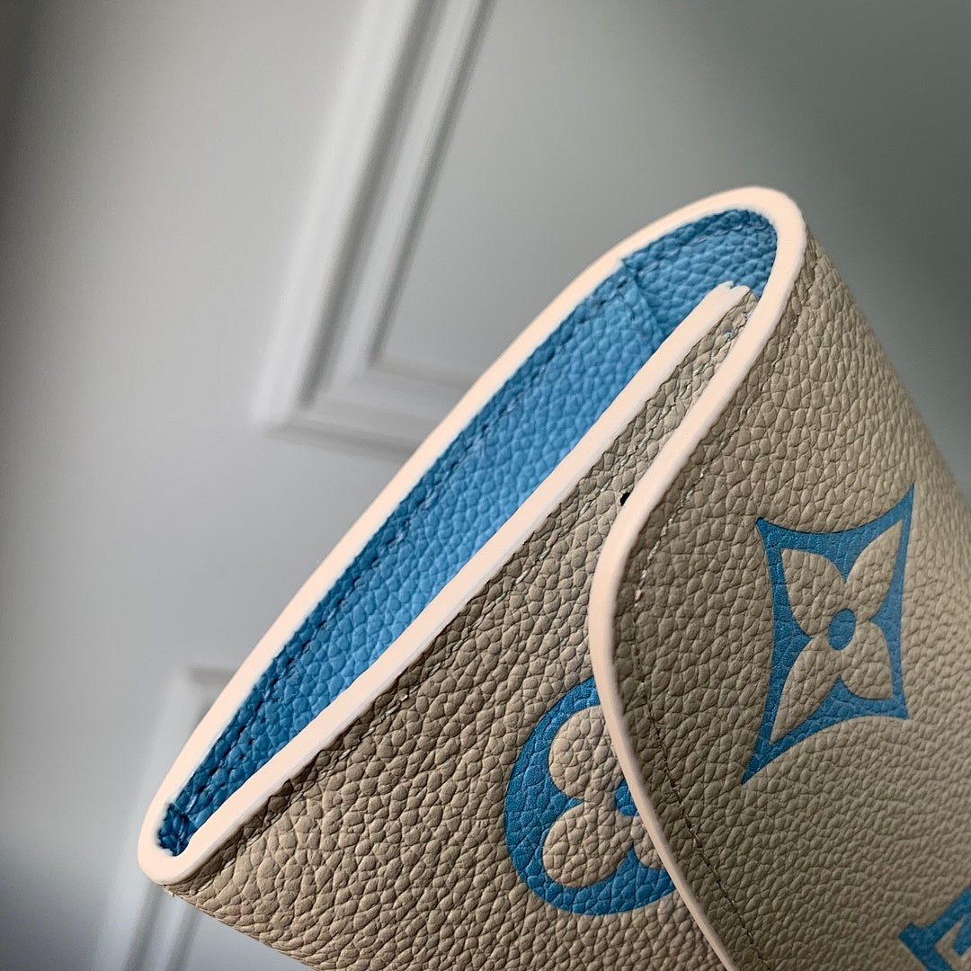 Portefeuille – Réf. M81049 · Bleu Brume