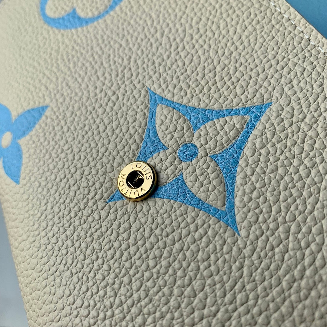 Portefeuille – Réf. M81049 · Bleu Brume