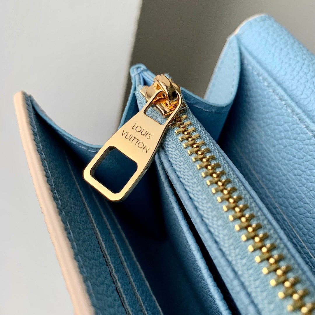 Portefeuille – Réf. M81049 · Bleu Brume