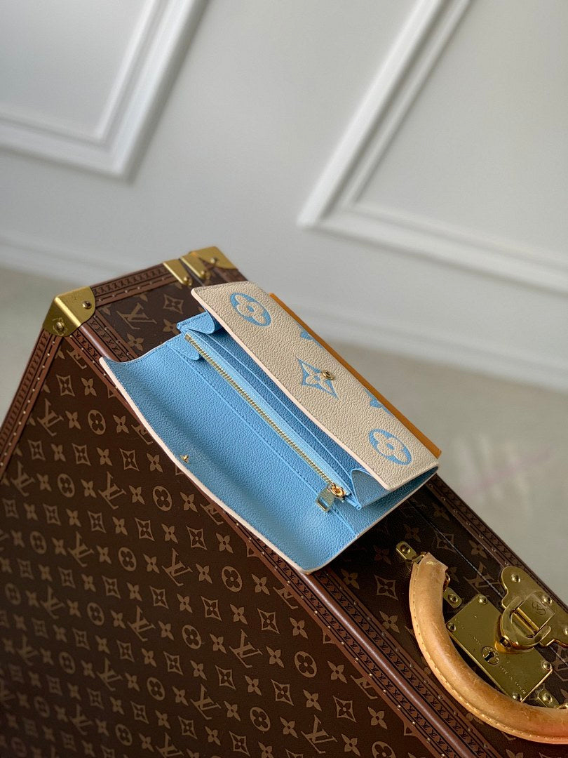 Portefeuille – Réf. M81049 · Bleu Brume