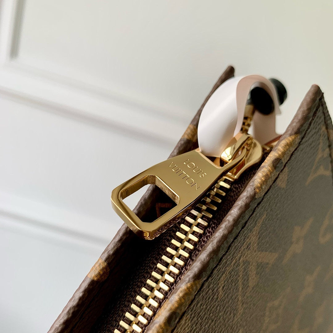 Pochette – Réf. M47543 · Monogram