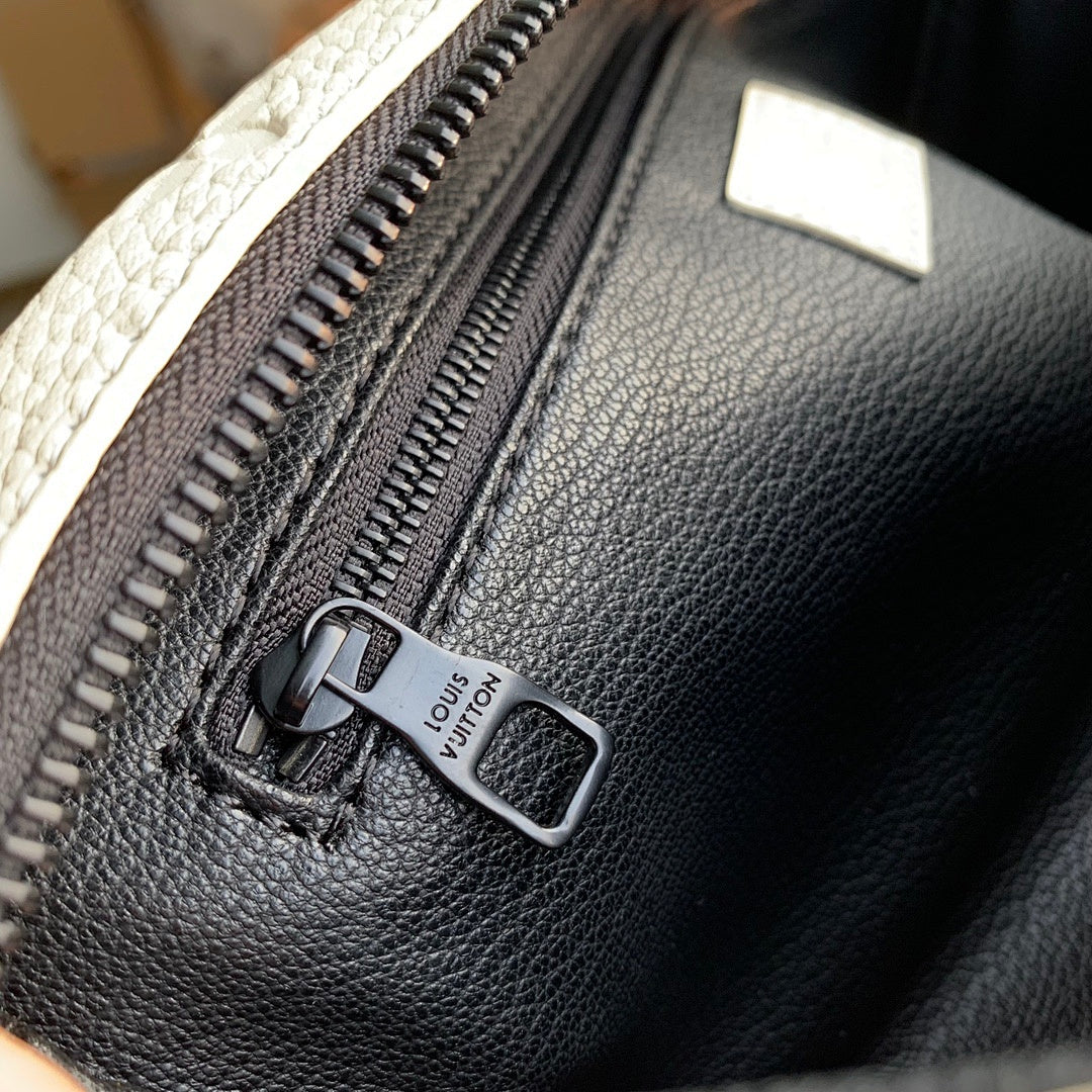 Pochette – Réf. M82576 · Cuir · Coloris 7
