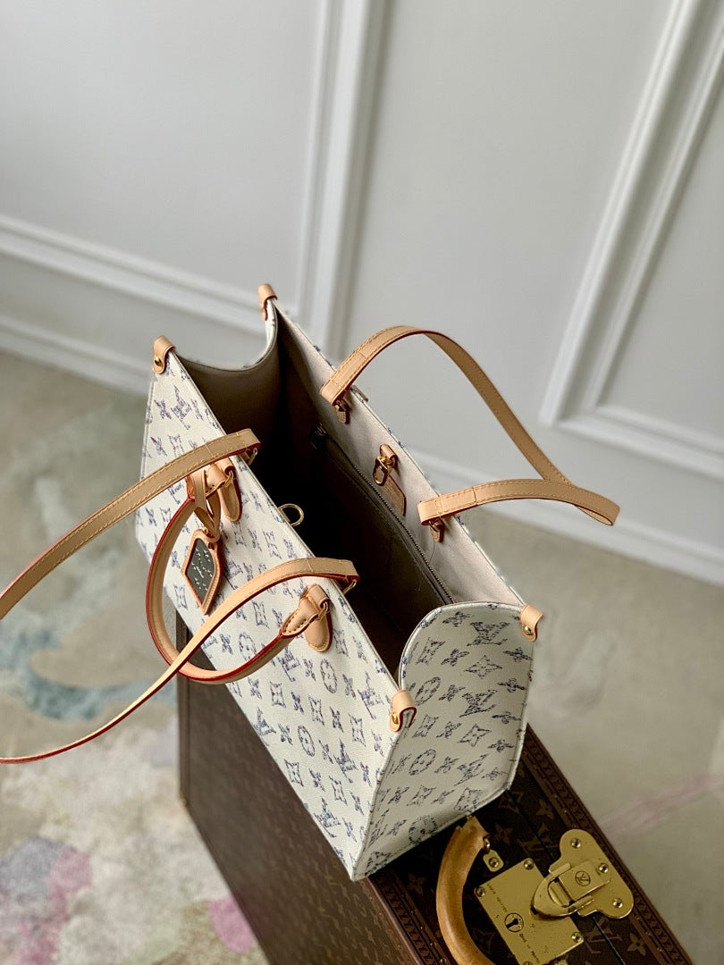 Sac à main OnTheGo – Réf. M24708 · Blanc