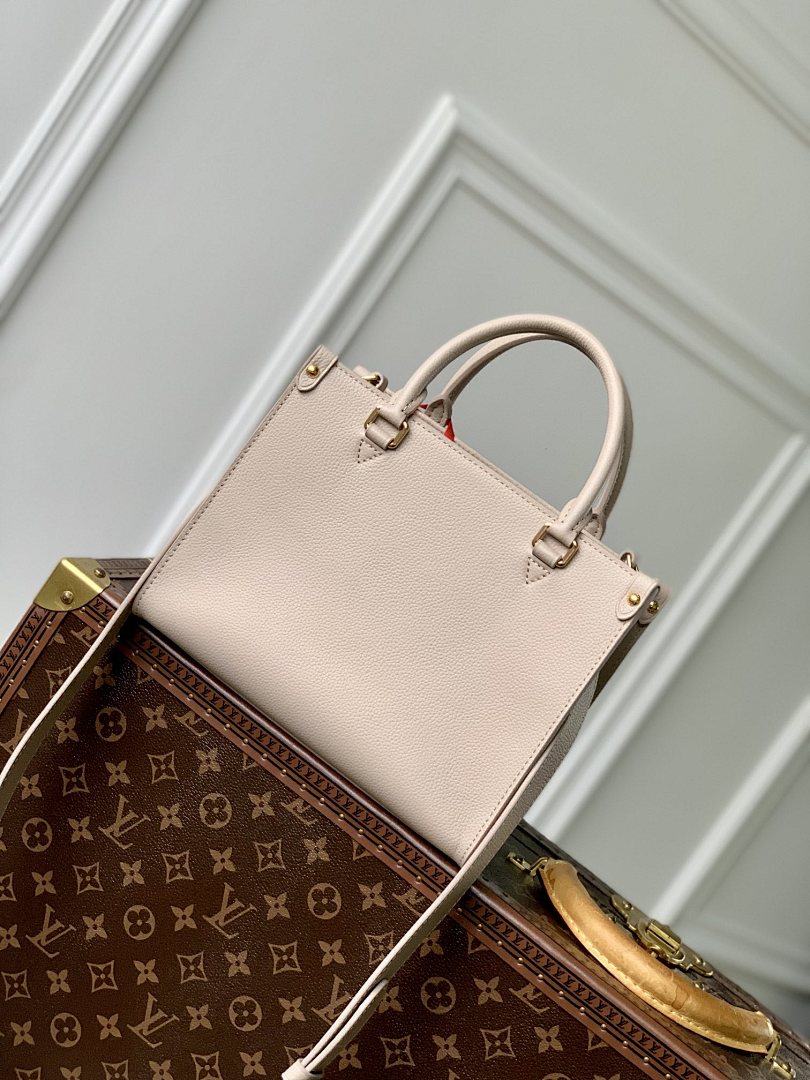 Sac à main OnTheGo – Réf. M22311 · Abricot Gris