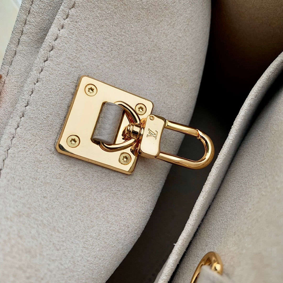 Sac à main OnTheGo – Réf. M22311 · Abricot Gris