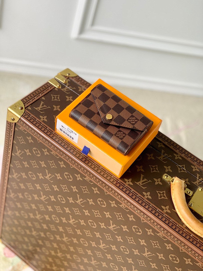 Portefeuille – Réf. HH140M41938 · Damier Ébène Rose