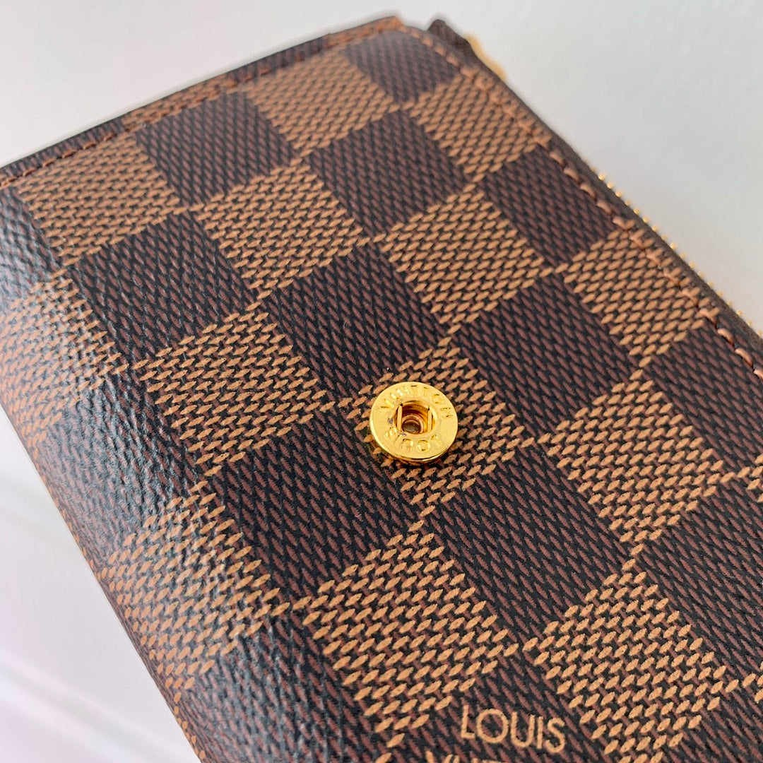 Portefeuille – Réf. HH140M41938 · Damier Ébène Rose