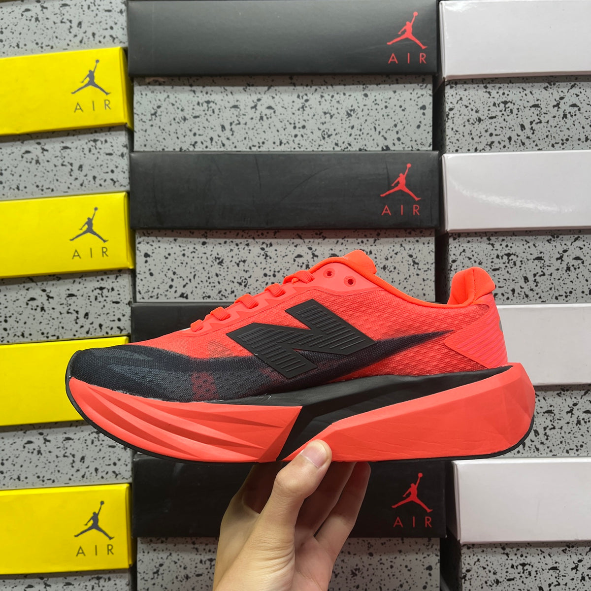New Balance FuelCell Rebel v5 'Orange Fluo Noir'