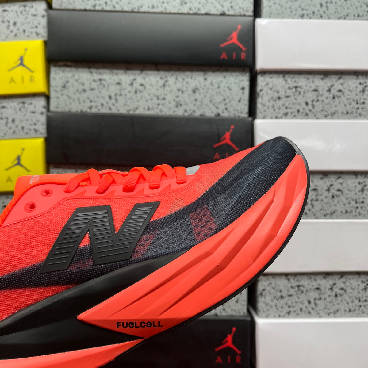 New Balance FuelCell Rebel v5 'Orange Fluo Noir'